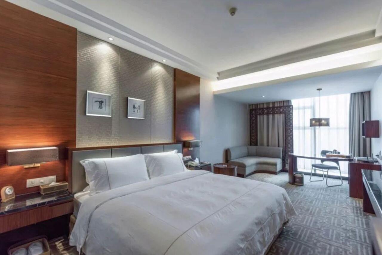 Hai Long Quan Hotel Урумчи Экстерьер фото
